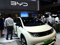 People look at various vehicles at the 23rd Autumn International Auto Show in Qingdao, China, on September 5, 2024. (