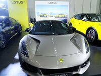 People look at various vehicles at the 23rd Autumn International Auto Show in Qingdao, China, on September 5, 2024. (