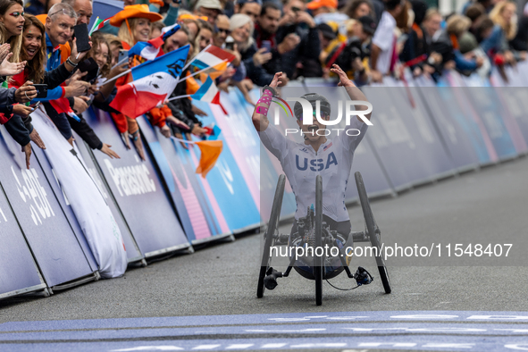 Oksana Masters reacts after she wins the Para-Cycling - Women's H5 Road Race at Clichy-sous-Bois during the Paris 2024 Paralympic Games in P...