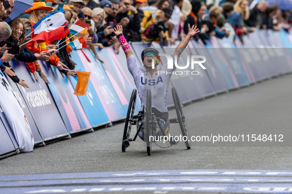 Oksana Masters reacts after she wins the Para-Cycling - Women's H5 Road Race at Clichy-sous-Bois during the Paris 2024 Paralympic Games in P...