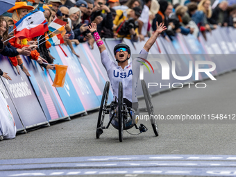 Oksana Masters reacts after she wins the Para-Cycling - Women's H5 Road Race at Clichy-sous-Bois during the Paris 2024 Paralympic Games in P...