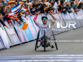 Oksana Masters reacts after she wins the Para-Cycling - Women's H5 Road Race at Clichy-sous-Bois during the Paris 2024 Paralympic Games in P...