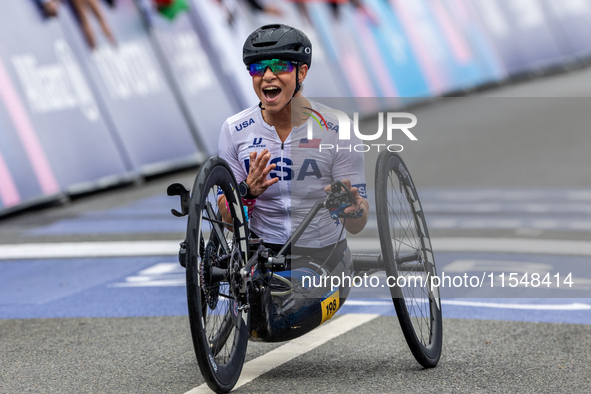 Oksana Masters reacts after she wins the Para-Cycling - Women's H5 Road Race at Clichy-sous-Bois during the Paris 2024 Paralympic Games in P...