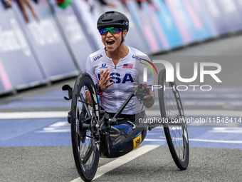 Oksana Masters reacts after she wins the Para-Cycling - Women's H5 Road Race at Clichy-sous-Bois during the Paris 2024 Paralympic Games in P...