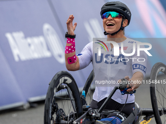 Oksana Masters reacts after she wins the Para-Cycling - Women's H5 Road Race at Clichy-sous-Bois during the Paris 2024 Paralympic Games in P...