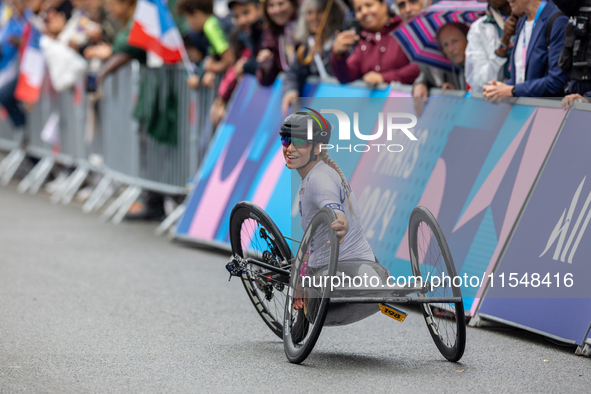 Oksana Masters reacts after she wins the Para-Cycling - Women's H5 Road Race at Clichy-sous-Bois during the Paris 2024 Paralympic Games in P...