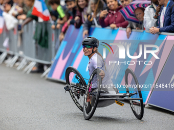 Oksana Masters reacts after she wins the Para-Cycling - Women's H5 Road Race at Clichy-sous-Bois during the Paris 2024 Paralympic Games in P...