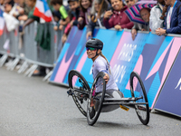 Oksana Masters reacts after she wins the Para-Cycling - Women's H5 Road Race at Clichy-sous-Bois during the Paris 2024 Paralympic Games in P...