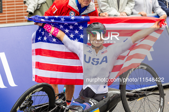 Oksana Masters reacts after she wins the Para-Cycling - Women's H5 Road Race at Clichy-sous-Bois during the Paris 2024 Paralympic Games in P...