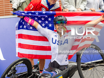 Oksana Masters reacts after she wins the Para-Cycling - Women's H5 Road Race at Clichy-sous-Bois during the Paris 2024 Paralympic Games in P...