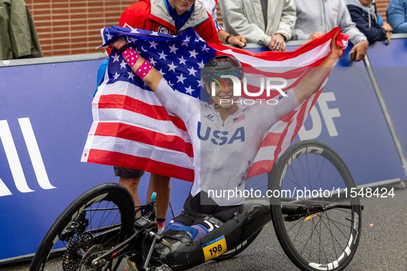 Oksana Masters reacts after she wins the Para-Cycling - Women's H5 Road Race at Clichy-sous-Bois during the Paris 2024 Paralympic Games in P...