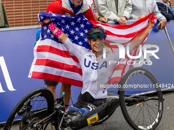 Oksana Masters reacts after she wins the Para-Cycling - Women's H5 Road Race at Clichy-sous-Bois during the Paris 2024 Paralympic Games in P...