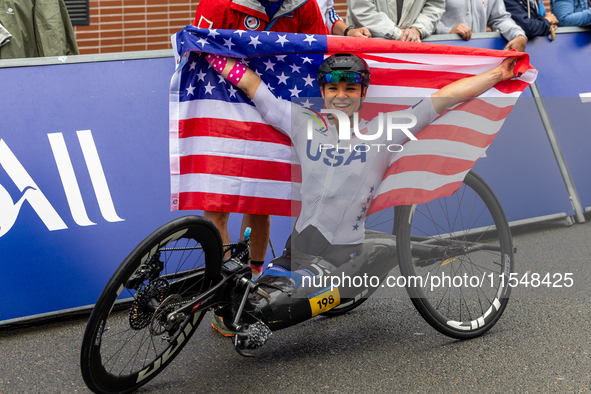 Oksana Masters reacts after she wins the Para-Cycling - Women's H5 Road Race at Clichy-sous-Bois during the Paris 2024 Paralympic Games in P...