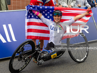 Oksana Masters reacts after she wins the Para-Cycling - Women's H5 Road Race at Clichy-sous-Bois during the Paris 2024 Paralympic Games in P...