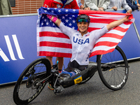 Oksana Masters reacts after she wins the Para-Cycling - Women's H5 Road Race at Clichy-sous-Bois during the Paris 2024 Paralympic Games in P...