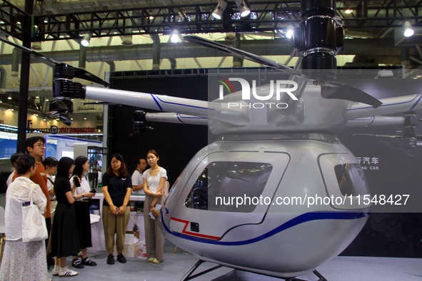 Visitors attend the 2024 Suzhou International New Energy Expo in Suzhou, China, on September 5, 2024. 