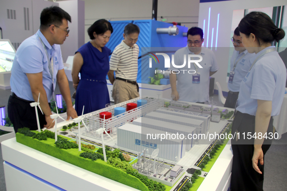 Visitors attend the 2024 Suzhou International New Energy Expo in Suzhou, China, on September 5, 2024. 