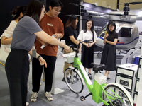 Visitors attend the 2024 Suzhou International New Energy Expo in Suzhou, China, on September 5, 2024. (