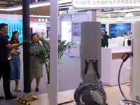 Visitors visit the Huawei Supercharger at the 2024 Suzhou International New Energy Expo in Suzhou, China, on September 5, 2024. (