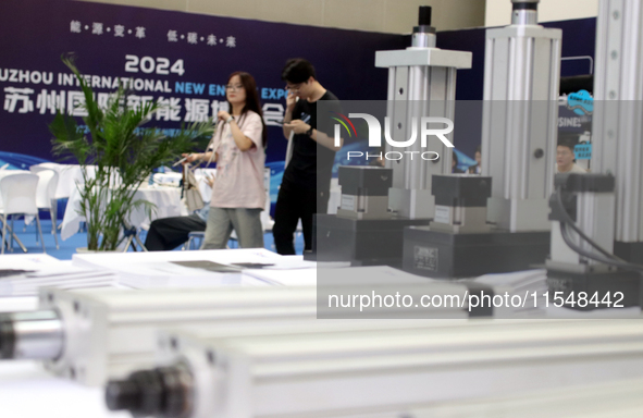 Visitors attend the 2024 Suzhou International New Energy Expo in Suzhou, China, on September 5, 2024. 