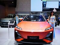 A model displays a new car at the 23rd Autumn International Auto Show in Qingdao, China, on September 5, 2024. (