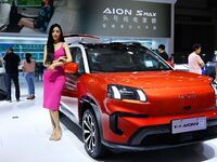 A model displays a new car at the 23rd Autumn International Auto Show in Qingdao, China, on September 5, 2024. (