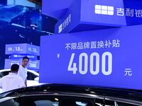 Promotional information about replacement vehicles is seen at the 23rd Autumn International Auto Show 2024 in Qingdao, China, on September 5...