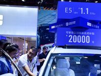 Promotional information about replacement vehicles is seen at the 23rd Autumn International Auto Show 2024 in Qingdao, China, on September 5...