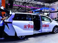 Promotional information about replacement vehicles is seen at the 23rd Autumn International Auto Show 2024 in Qingdao, China, on September 5...