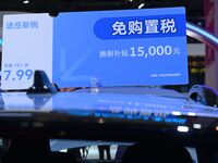 Promotional information about replacement vehicles is seen at the 23rd Autumn International Auto Show 2024 in Qingdao, China, on September 5...