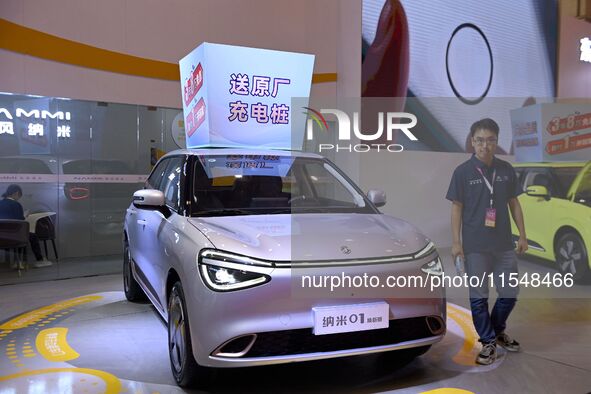 Promotional information about replacement vehicles is seen at the 23rd Autumn International Auto Show 2024 in Qingdao, China, on September 5...