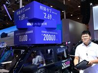 Promotional information about replacement vehicles is seen at the 23rd Autumn International Auto Show 2024 in Qingdao, China, on September 5...