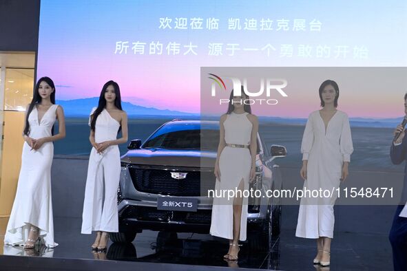 A new car is unveiled at the 23rd Autumn International Auto Show in Qingdao, China, on September 5, 2024. 