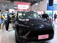 People look at various vehicles at the 23rd Autumn International Auto Show in Qingdao, China, on September 5, 2024. (