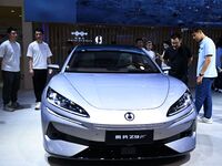 People look at various vehicles at the 23rd Autumn International Auto Show in Qingdao, China, on September 5, 2024. (