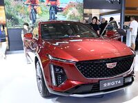 People look at various vehicles at the 23rd Autumn International Auto Show in Qingdao, China, on September 5, 2024. (