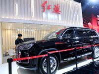 People look at various vehicles at the 23rd Autumn International Auto Show in Qingdao, China, on September 5, 2024. (