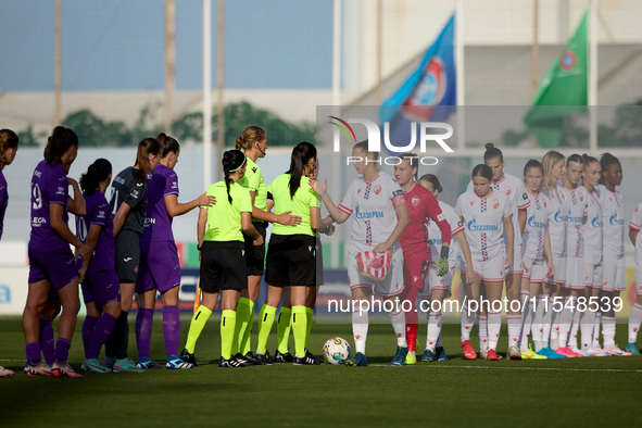 In Ta' Qali, Malta, on September 4, 2024, Anderlecht and Crvena Zvezda players shake hands prior to the UEFA Women's Champions League First...