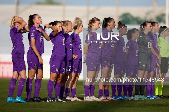 Anderlecht players stand prior to the UEFA Women's Champions League First qualifying round, Semi-finals CP-Group 4 soccer match between Ande...