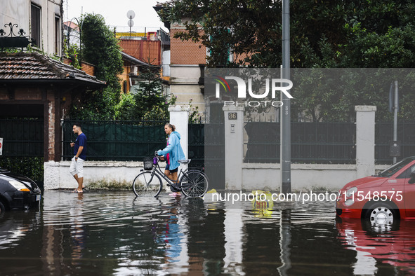 A view of roads and cars submerged during the storm and flooding of Ponte Lambro in Milan, Italy, on September 5, 2024 