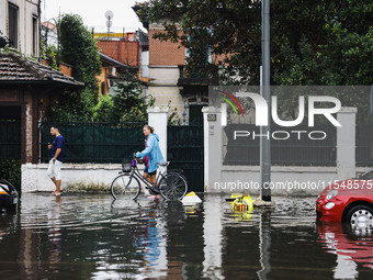 A view of roads and cars submerged during the storm and flooding of Ponte Lambro in Milan, Italy, on September 5, 2024 (