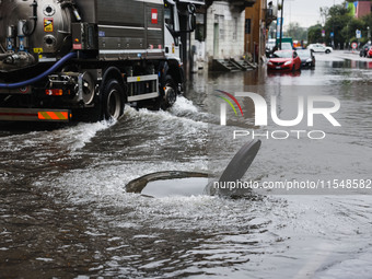 A view of roads and cars submerged during the storm and flooding of Ponte Lambro in Milan, Italy, on September 5, 2024 (