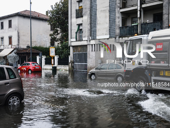 A view of roads and cars submerged during the storm and flooding of Ponte Lambro in Milan, Italy, on September 5, 2024 (