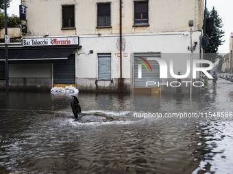 A view of roads and cars submerged during the storm and flooding of Ponte Lambro in Milan, Italy, on September 5, 2024 (