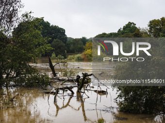 A view of roads and cars submerged during the storm and flooding of Ponte Lambro in Milan, Italy, on September 5, 2024 (