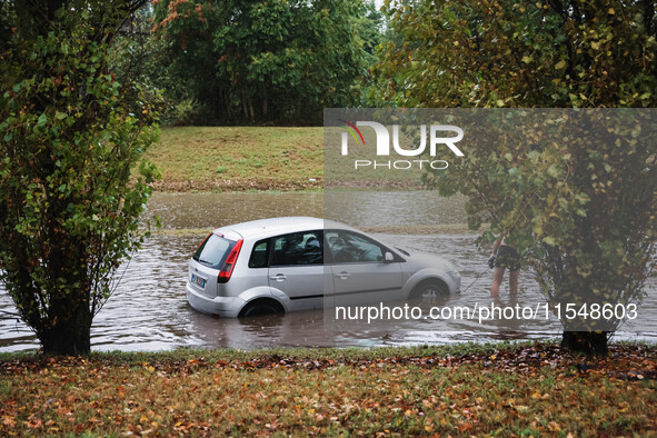 A view of roads and cars submerged during the storm and flooding of Ponte Lambro in Milan, Italy, on September 5, 2024 