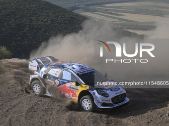 Driver Gregoire Munster and co-driver Louis Louka of the team M-Sport Ford World Rally Team Ford Puma Rally1 Hybrid face shakedown during th...