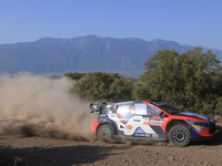 Driver Thierry Neuville and co-driver Martijn Wydaeghe of the Hyundai Shell Mobis World Rally Team, in a Hyundai i20 N Rally1 Hybrid, face s...