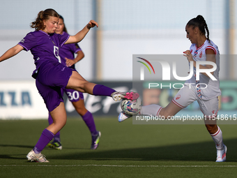 Senna Koeleman of Anderlecht competes for the ball with Nina Matejic of Crvena Zvezda during the UEFA Women's Champions League First qualify...