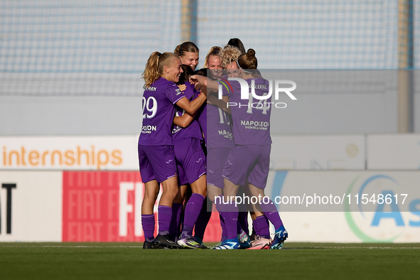 Stefania Vatafu (center number 10 partially hidden) of Anderlecht is celebrated by her teammates after scoring the 1-0 goal for her team dur...